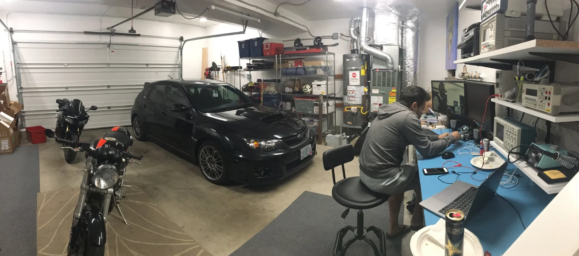 Tim Chou working in the garage workshop